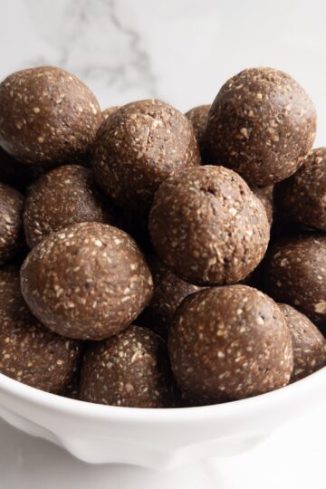 Chocolatey power balls sitting in a bowl