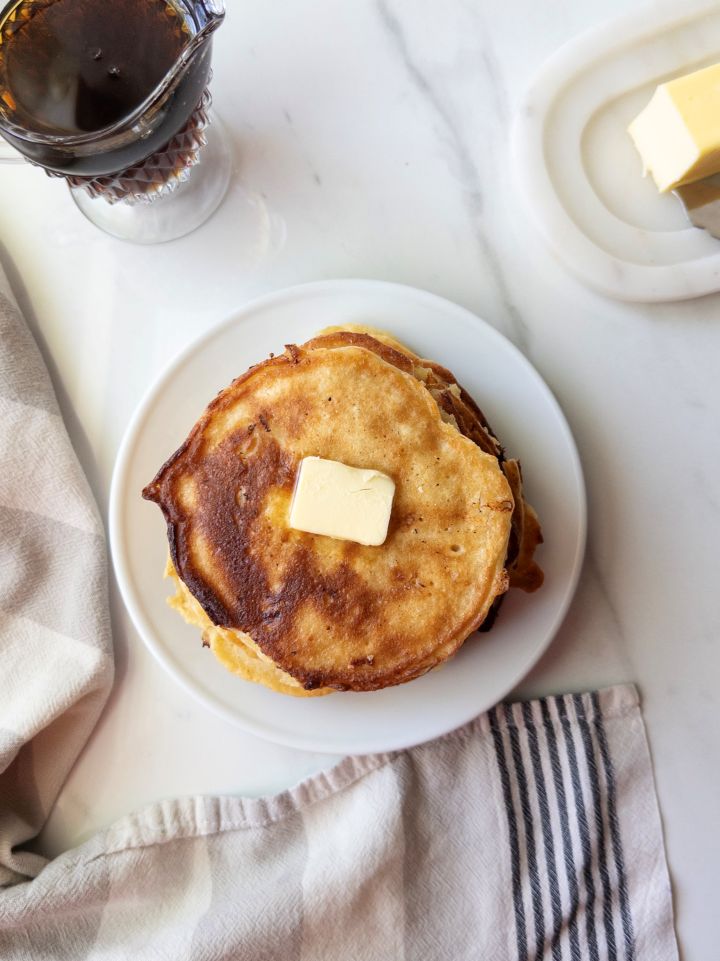 Fresh Milled Flour Pancakes with Cottage Cheese with syrup and butter on the side