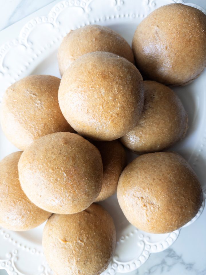 Plate stacked with Fresh Milled Flour Hamburger Buns Ready in One Hour