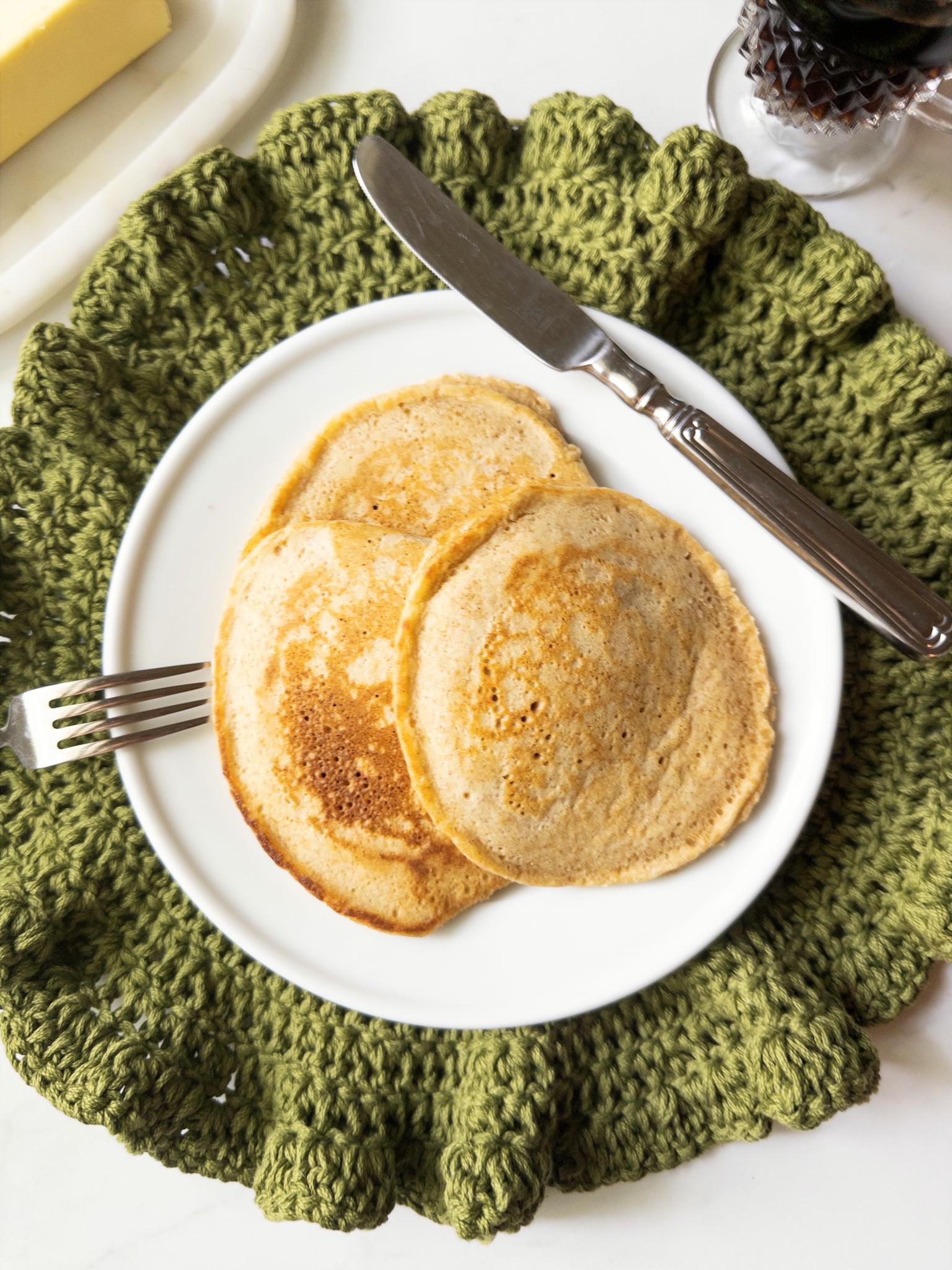 Fresh milled flour buttermilk pancakes plated with a fork